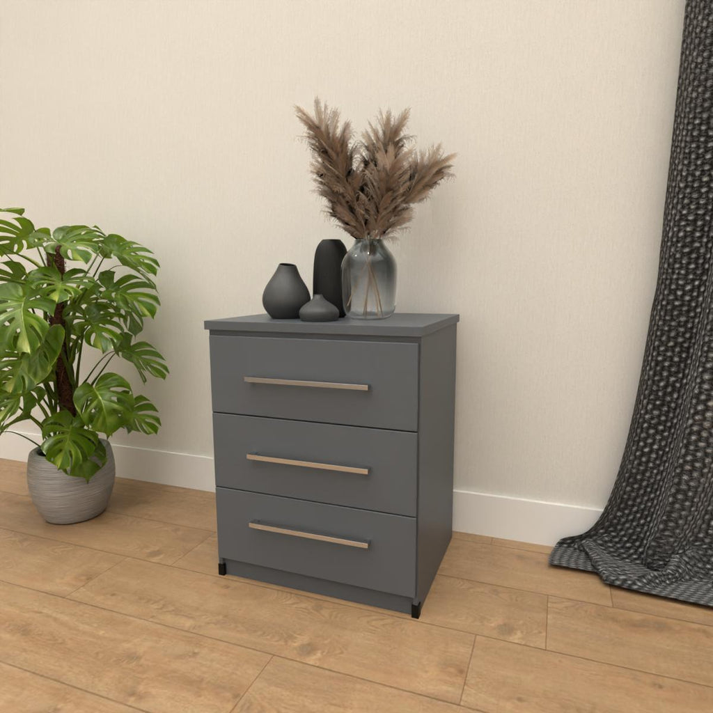 Grey 3 drawer bedside table with modern bedroom storage design